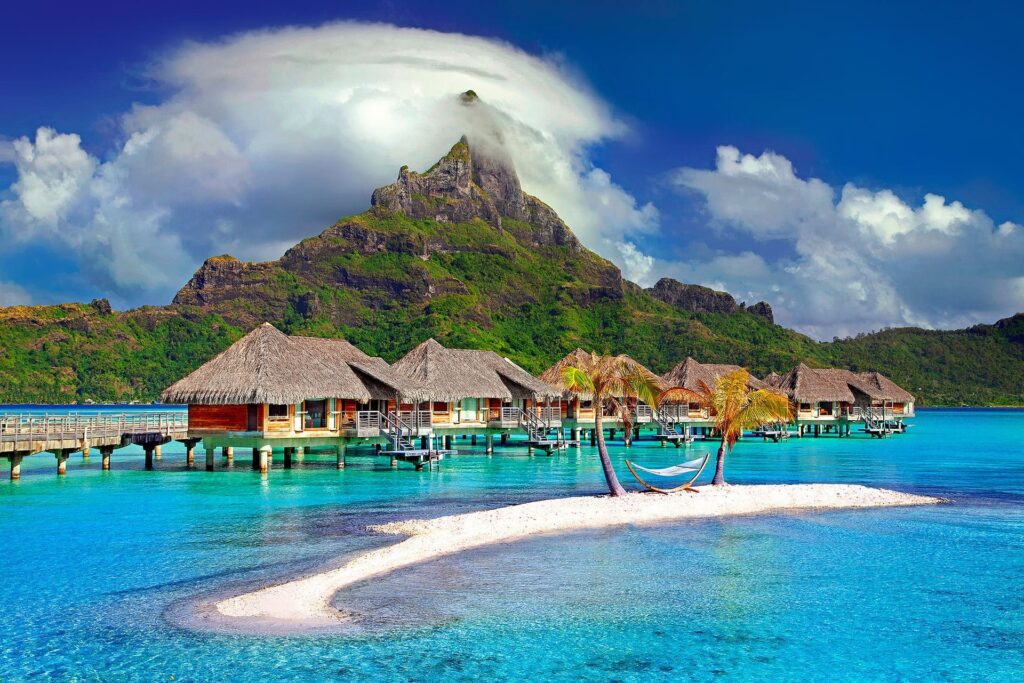 Réaliser ses désirs avec un voyage à Bora Bora proche d'une mer turquoise.